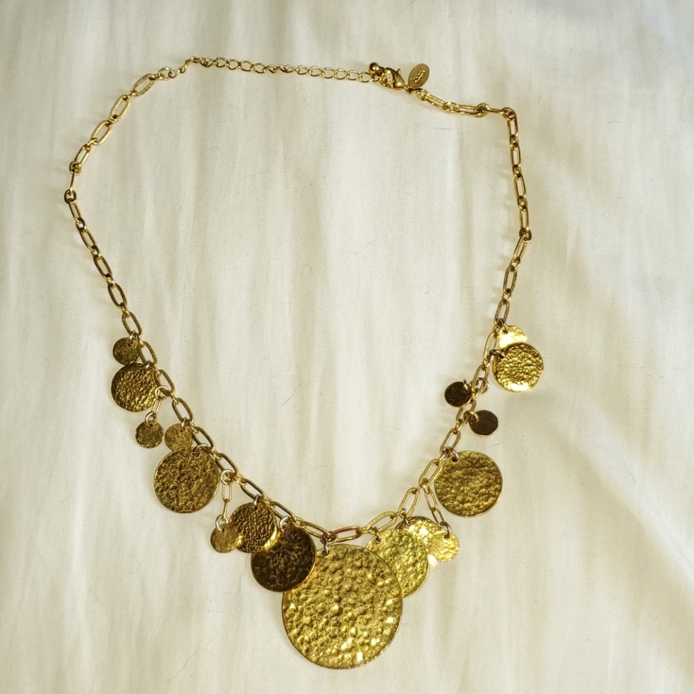 Hammered gold medallion